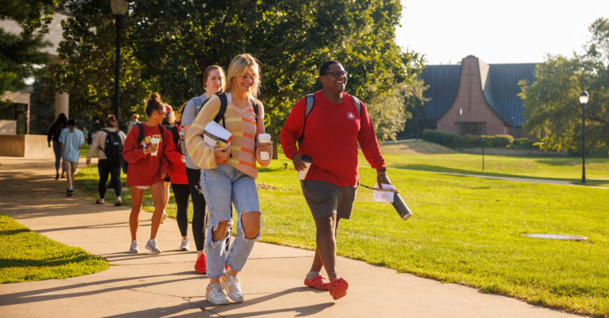 Central College students walking near Vermeer Science Center.