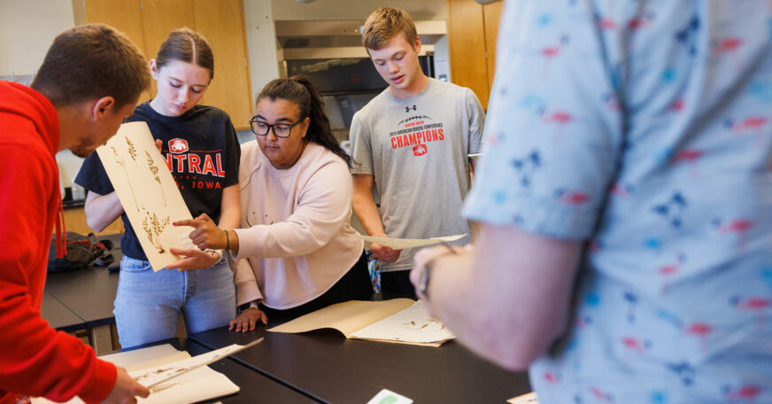 Central College students participating in a biology lab.