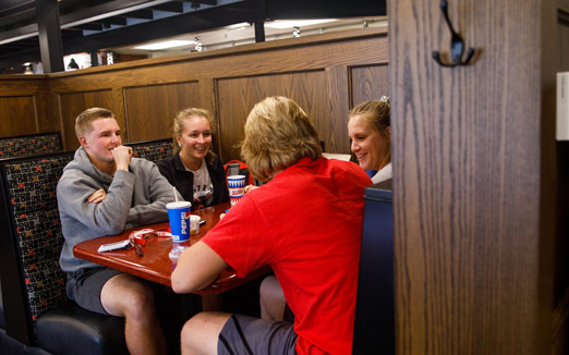 Central College students enjoying a meal at Fred’s, one of the dining options on campus.