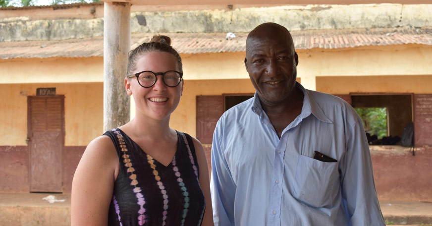 Cody Bock ’17 stands with her school’s principal on her last day working as a math teacher in Guinea.