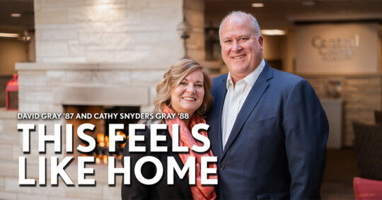 "This Feels Like Home" text overlay with a photo of David and Cathy Snyders Gray in the background.
