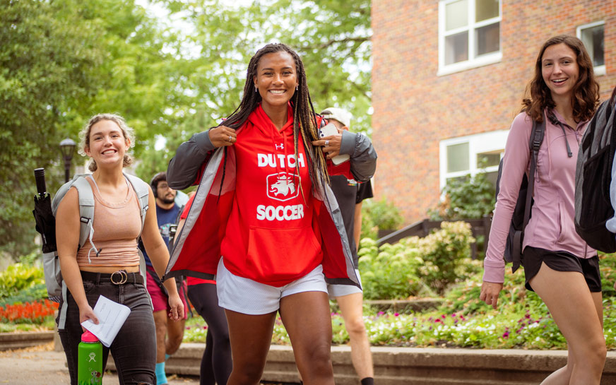 Central College students walking along the Peace Mall.